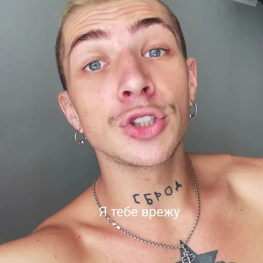 human face person necklace