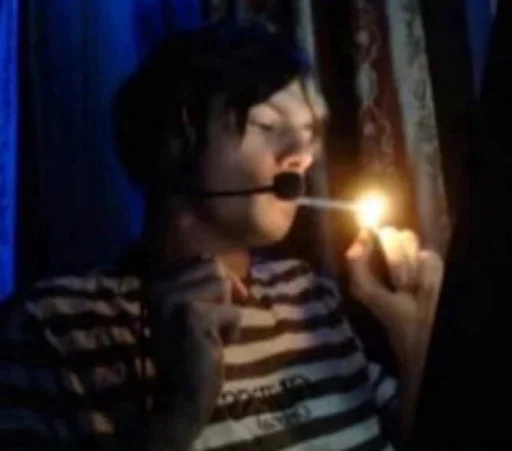 person candle lighter