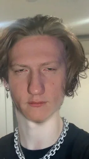 person human face necklace