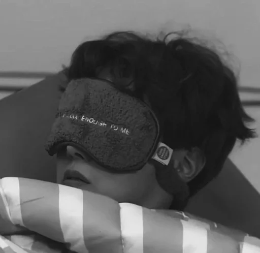 black and white person blindfold