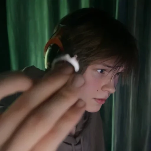 person indoor curtain