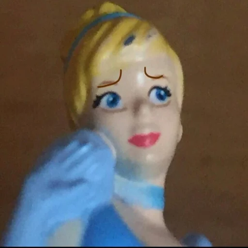 cartoon human face doll