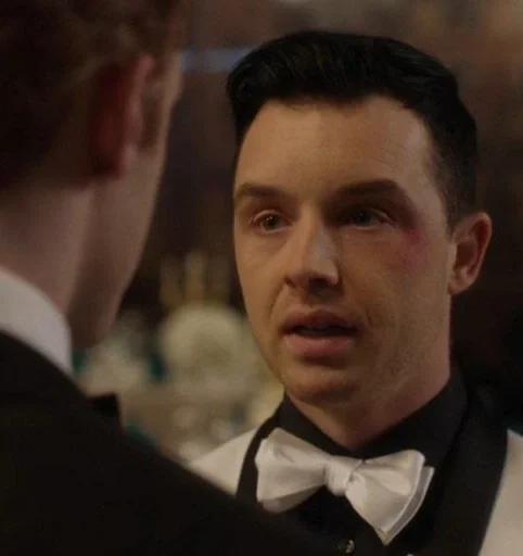 person human face bow tie