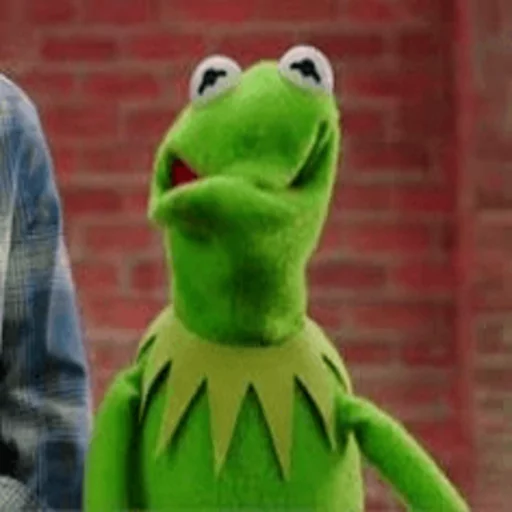 игрушка мультфильм зеленый