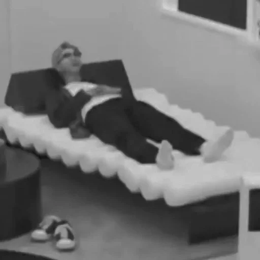black and white human face couch