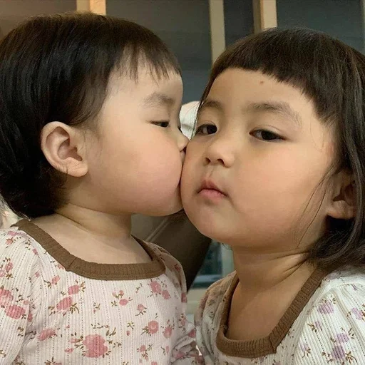 person kiss human face
