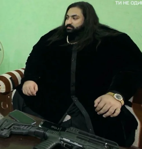 weapon clothing person