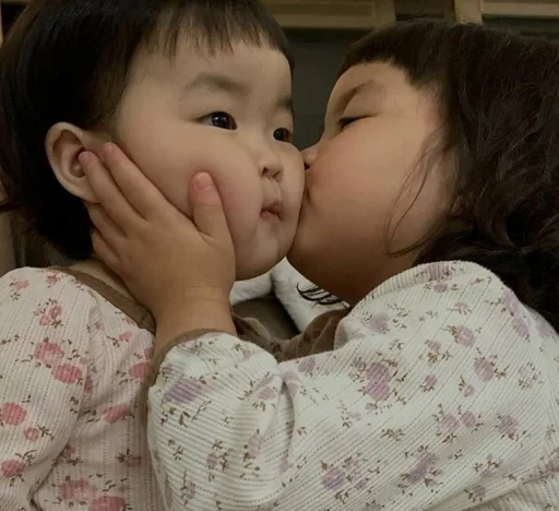 person kiss human face