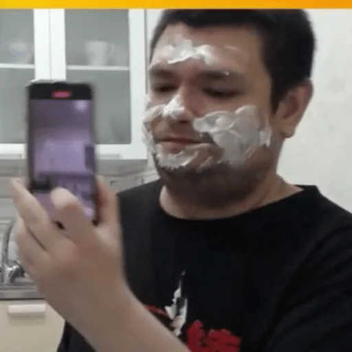 person mobile phone human face