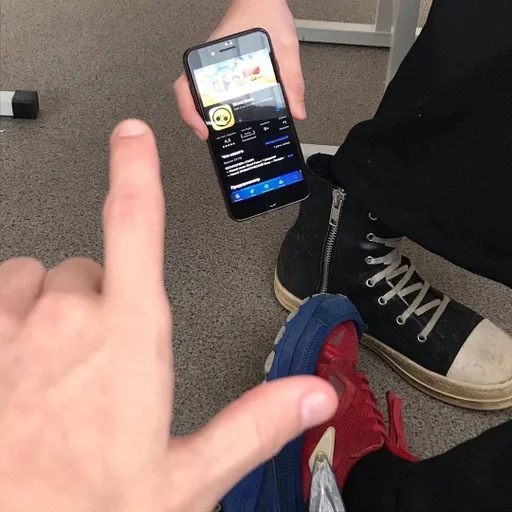 person mobile phone footwear