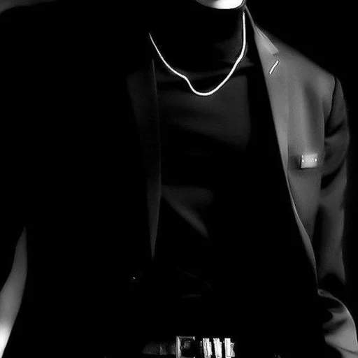 black and white necklace person