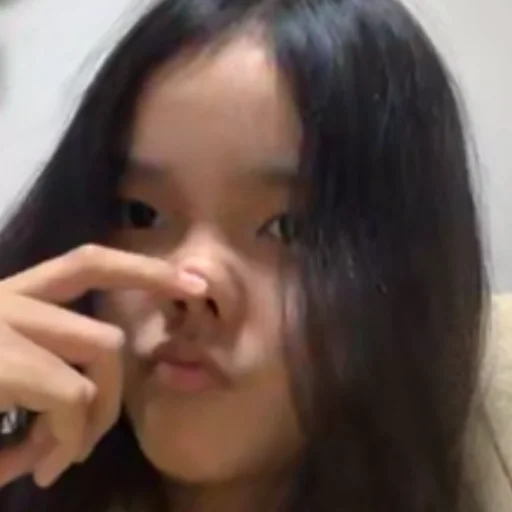 person human face black hair