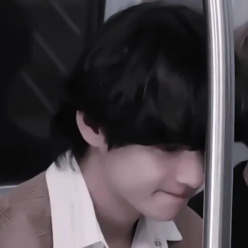 person mirror black hair