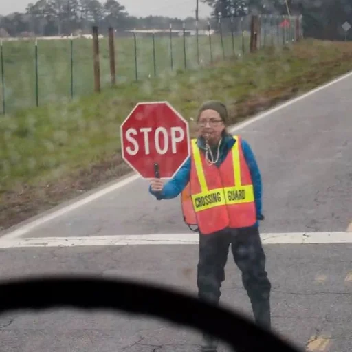 outdoor person traffic sign